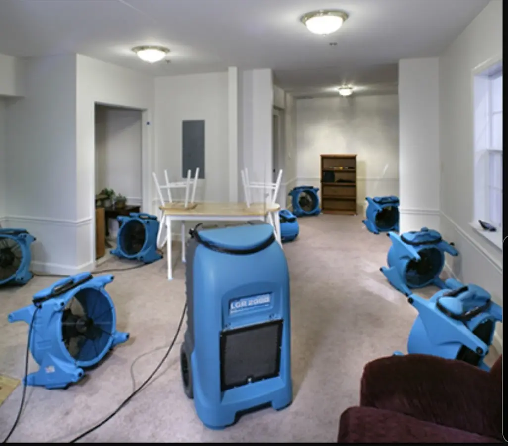 Air movers and dehumidifier setup for Water Damage Restoration in Herndon